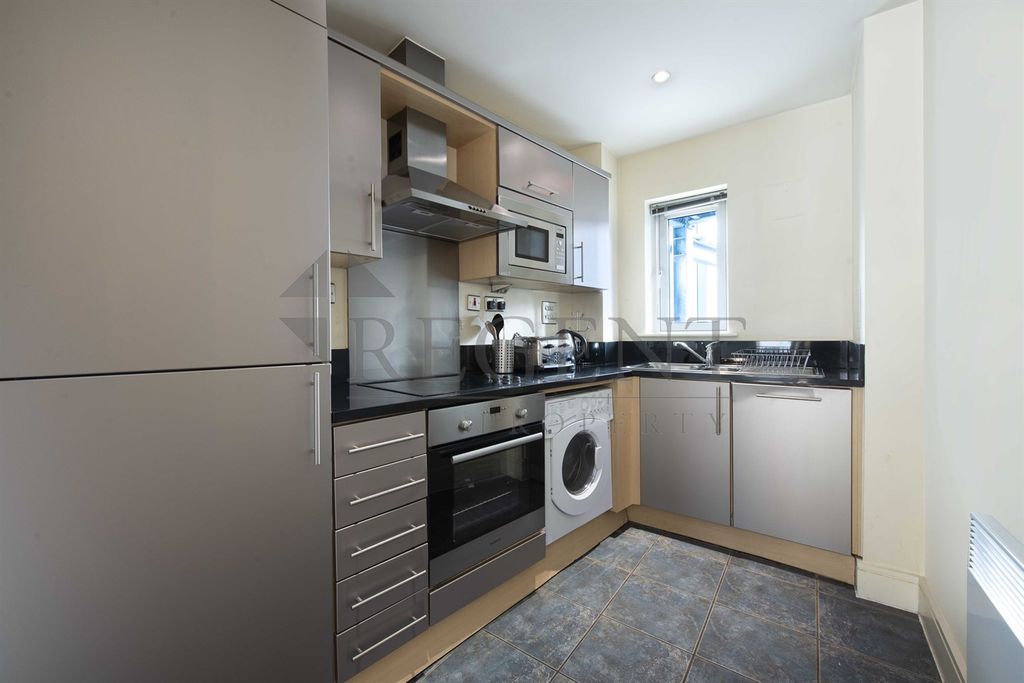 Property photo 3 of 8 Kitchen View