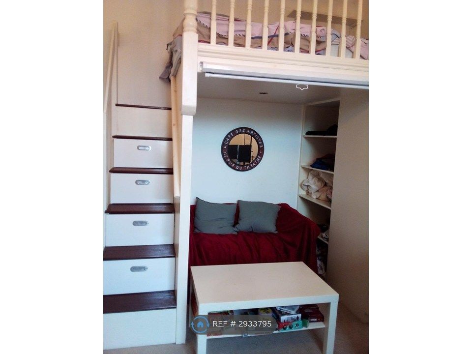 Property photo 3 of 10 Platform Bed Above Seating Area