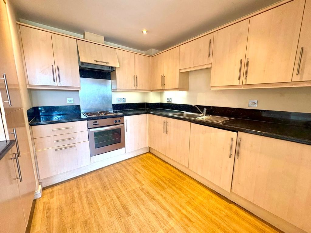 Property photo 3 of 8 Kitchen
