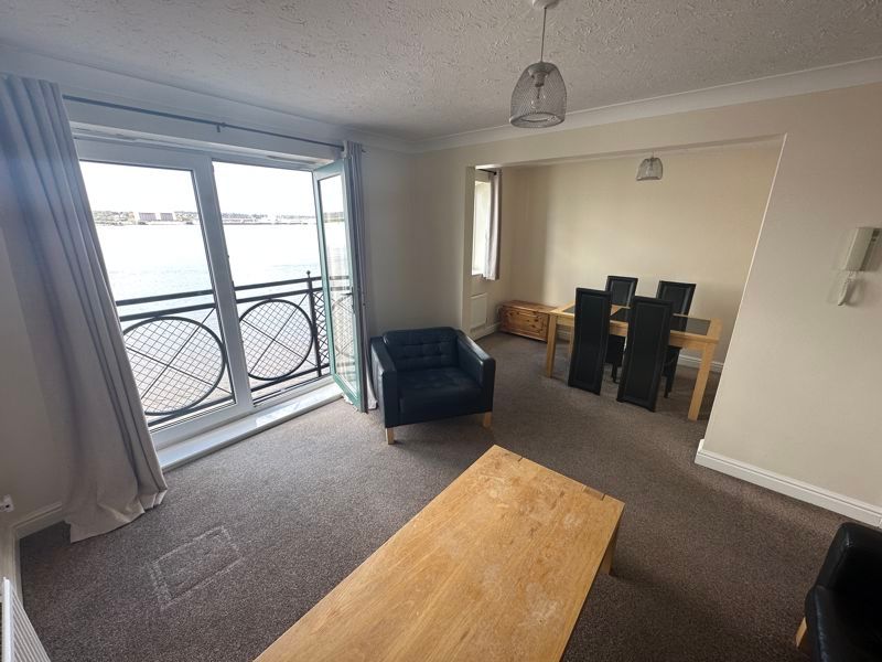 Property photo 3 of 19 Lounge And Dining With Balcony