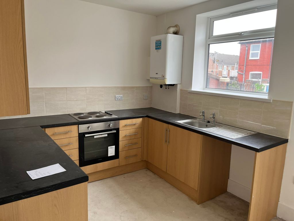 Property photo 3 of 7 Kitchen