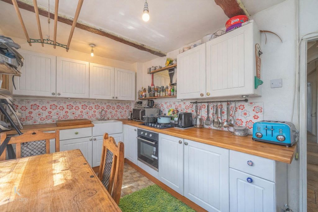 Property photo 3 of 13 Rustic Country Kitchen With Cozy Details.Jpg