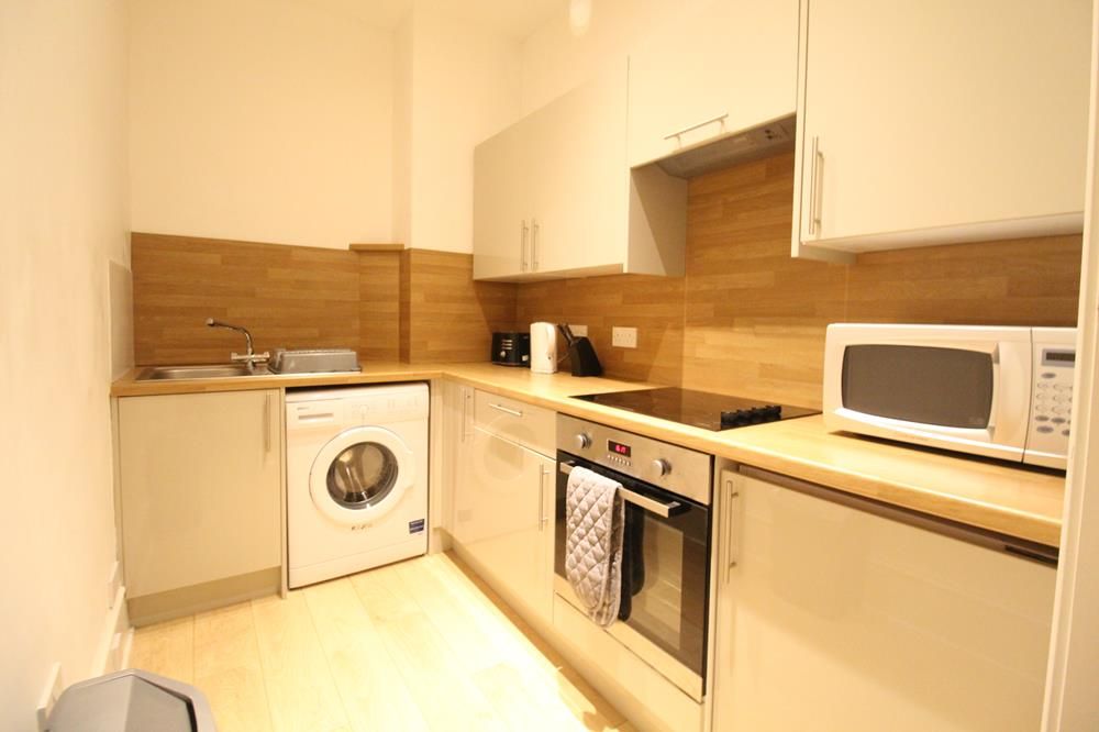 Property photo 2 of 6 Kitchen