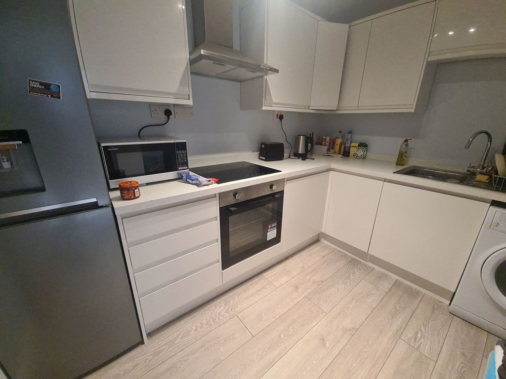 Property photo 2 of 3 A Modern And Well-Maintained Kitchen Featuring Sle...