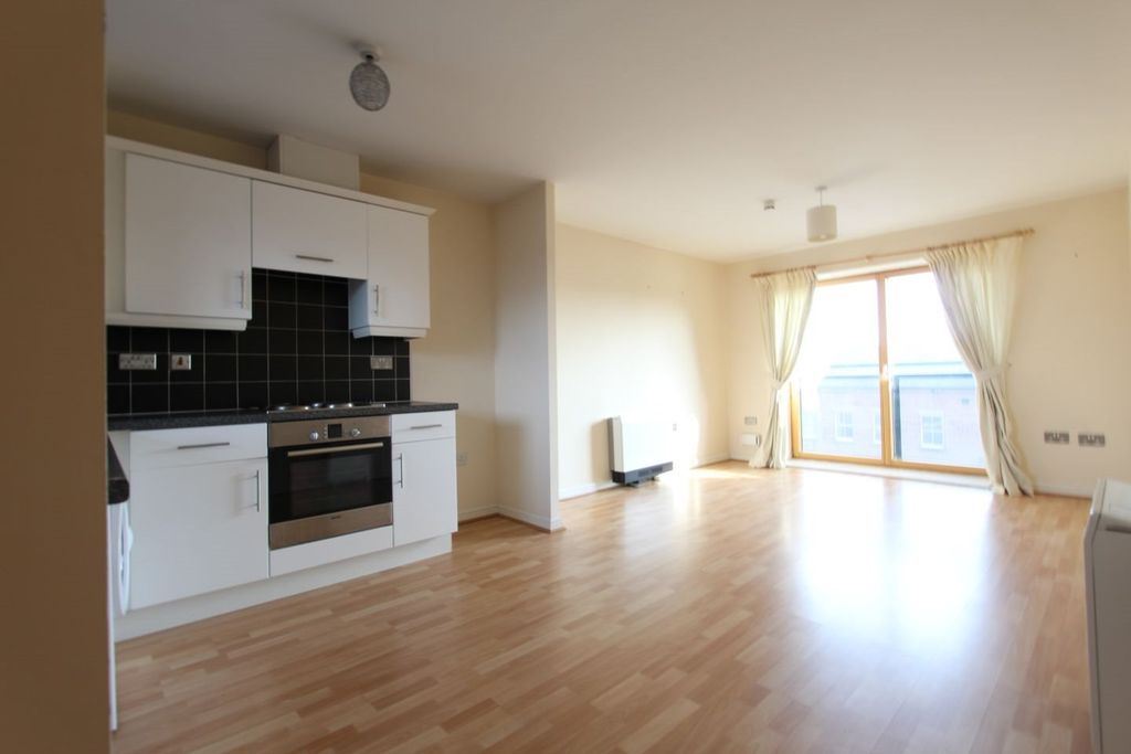 Property photo 3 of 7 Kitchen And Living Area