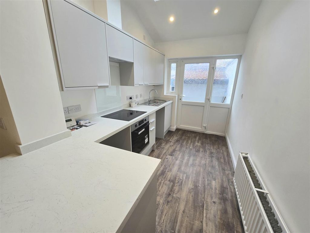 Property photo 2 of 7 Kitchen Area