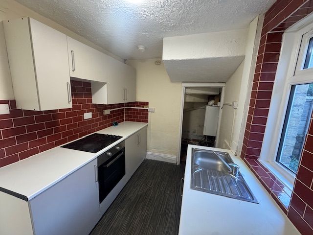 Property photo 2 of 8 Front Description 2