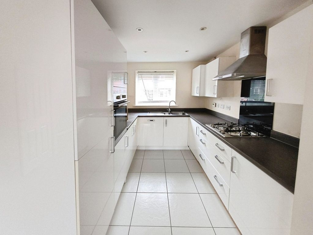 Property photo 3 of 12 Kitchen