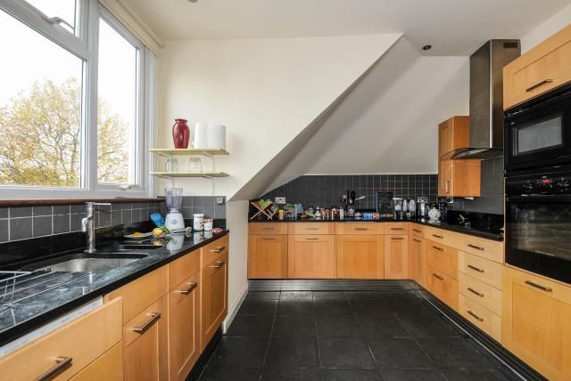 Property photo 2 of 8 Kitchen
