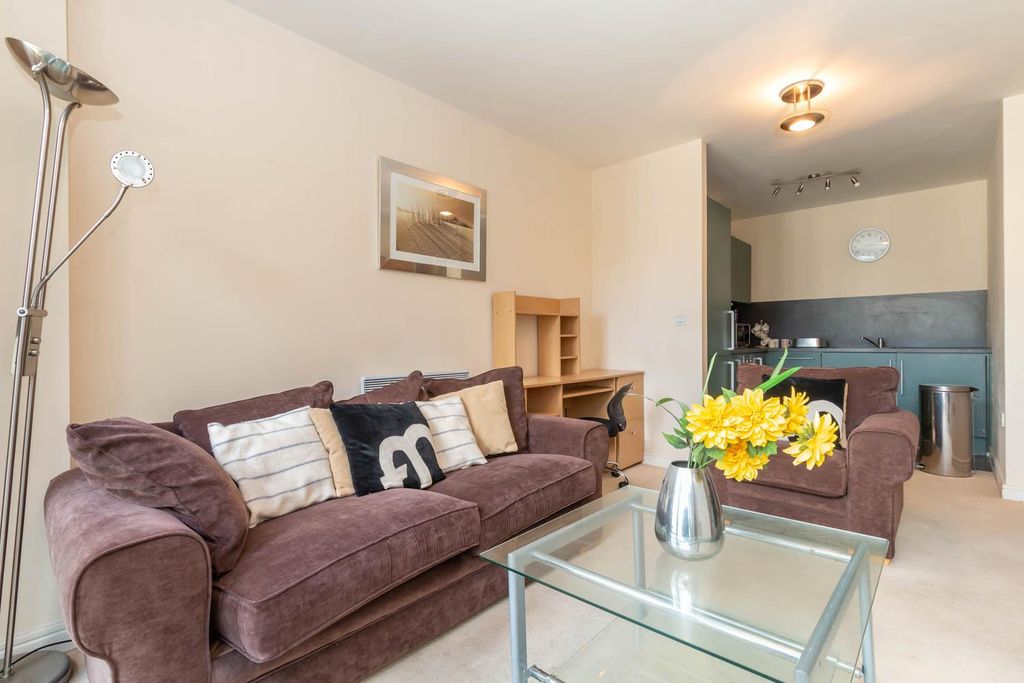 Property photo 1 of 10 Living Area