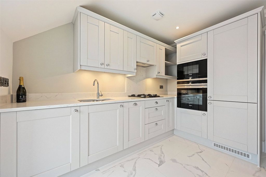 Property photo 3 of 12 Kitchen