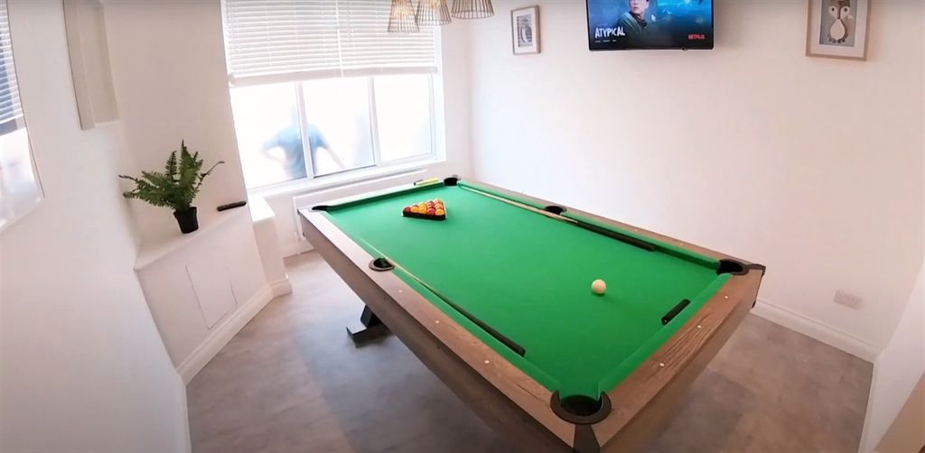 Property photo 2 of 12 A Bright And Tidy Living Room Featuring A Vibrant ...