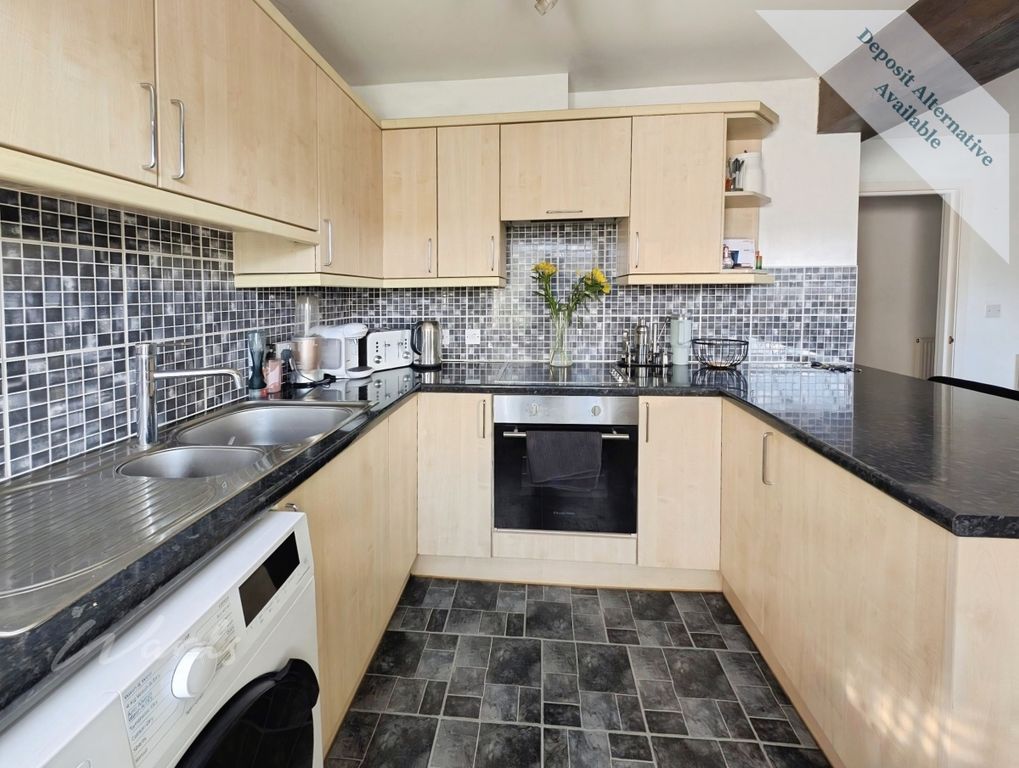 Property photo 3 of 7 Kitchen