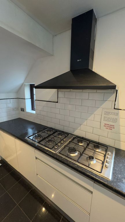 Property photo 3 of 12 Kitchen