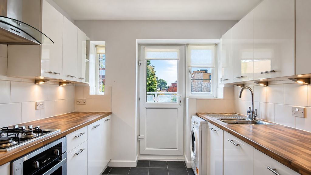 Property photo 3 of 11 Kitchen And Back Door
