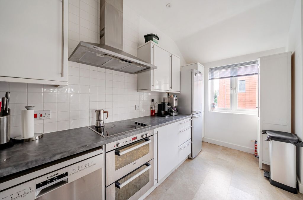 Property photo 3 of 12 Kitchen