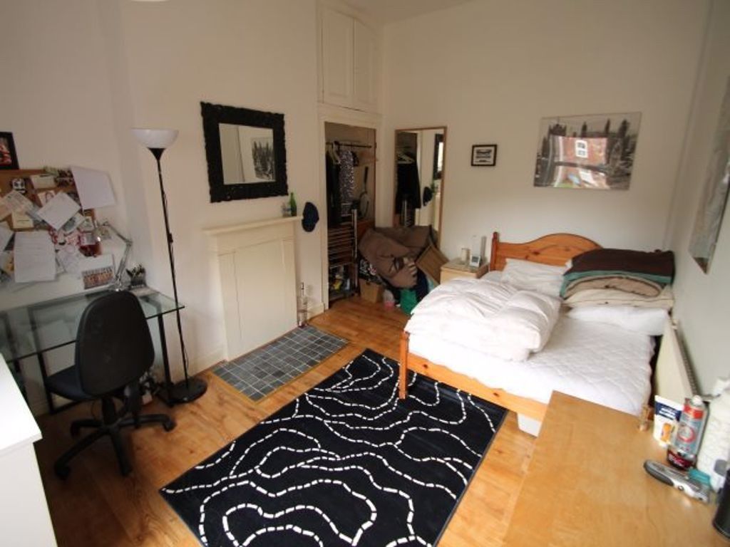 Property photo 1 of 10 A Spacious And Inviting Master Bedroom Featuring A...