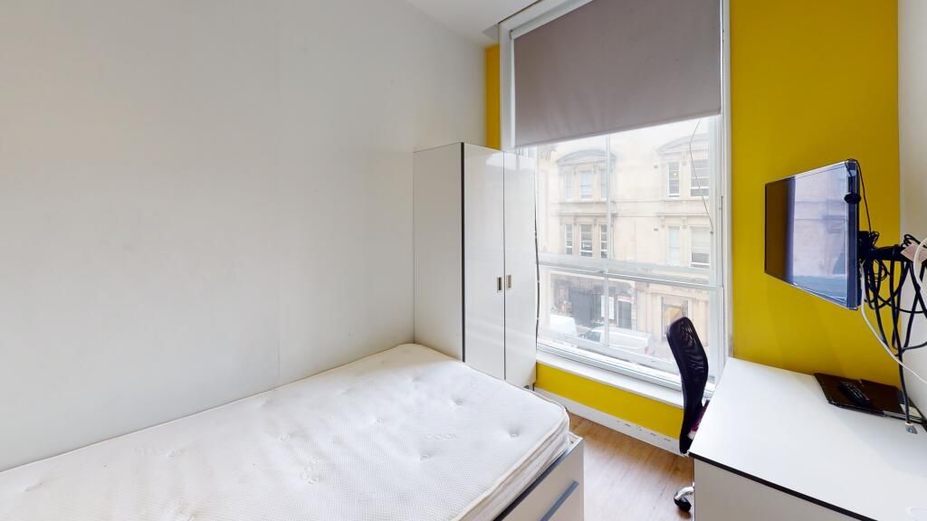 Property photo 2 of 3 Bright And Minimalist Single Bedroom Featuring A c...