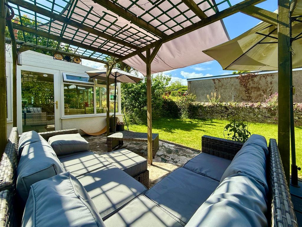 Property photo 2 of 24 Pergola Seating Area.Jpg