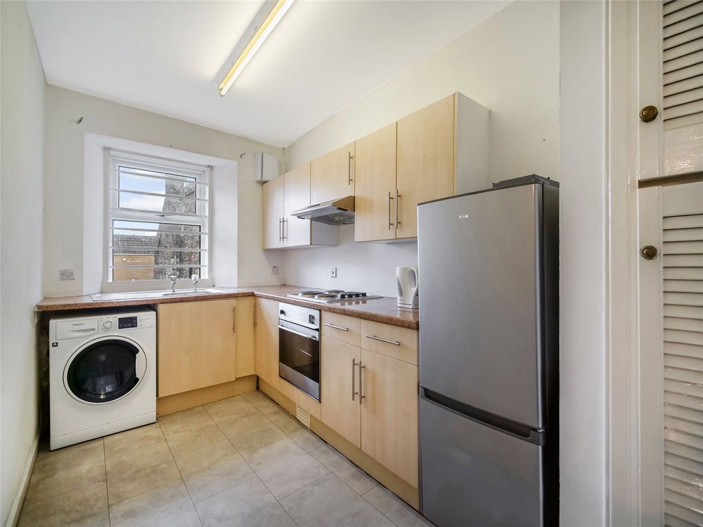 Property photo 3 of 7 Kitchen