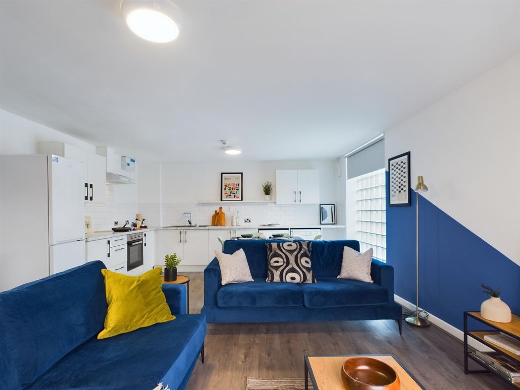 Property photo 3 of 41 A Bright And Modern Living Room Featuring Two Comf...