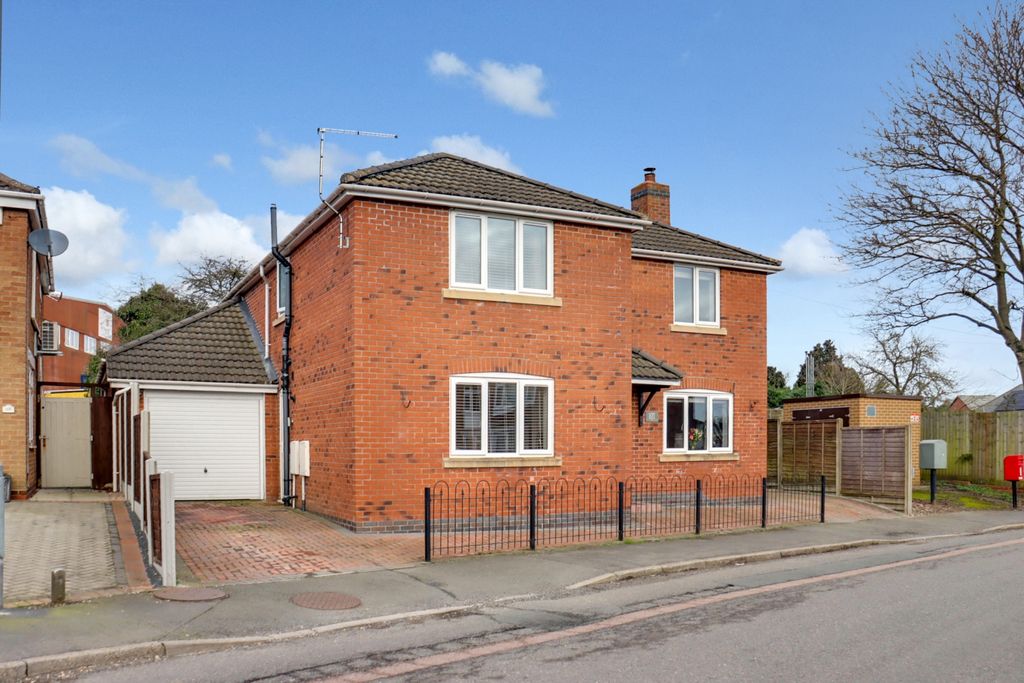 Property photo 1 of 19 Front Of Property With Garage