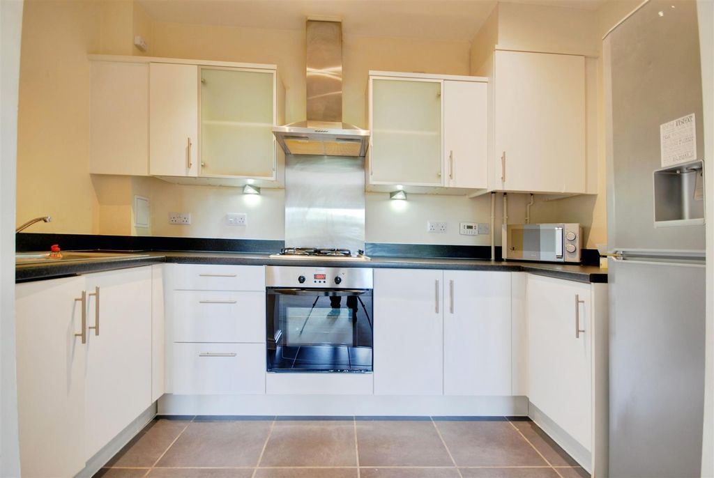 Property photo 2 of 12 Kitchen