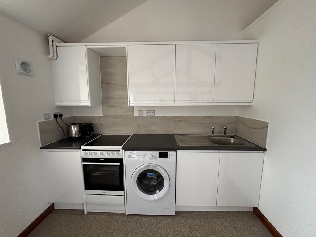 Property photo 3 of 9 Unit One Kitchen