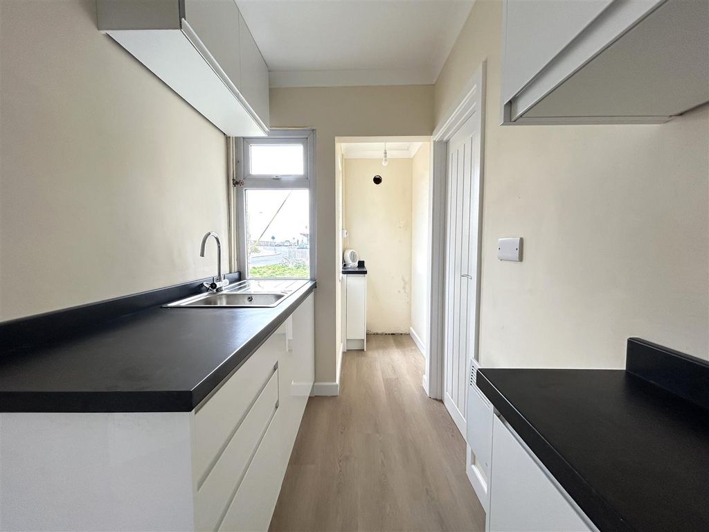 Property photo 3 of 9 Kitchen Area