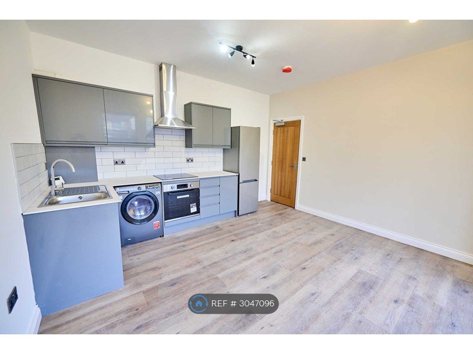 Property photo 3 of 7 Kitchen Living
