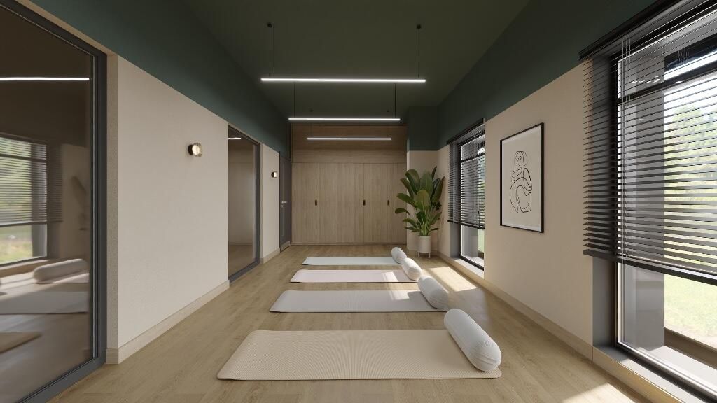 Property photo 3 of 12 A Modern And Bright Gym Room Featuring Yoga Mats N...