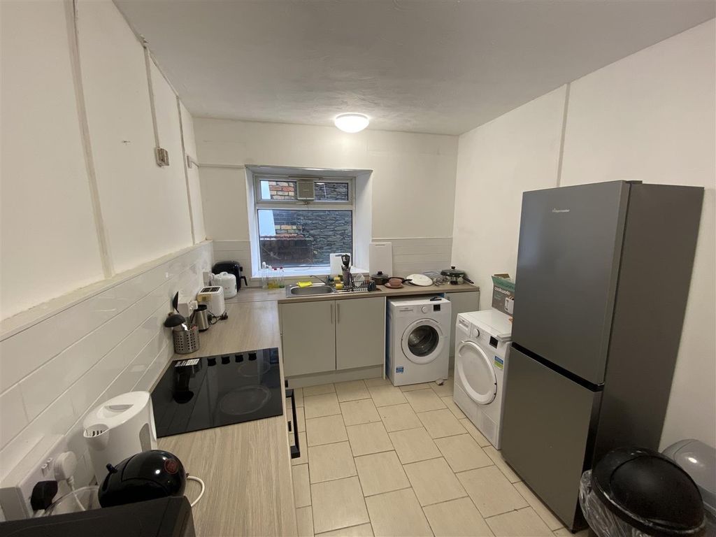Property photo 1 of 7 Bright Kitchen With Modern Appliances And Storage...