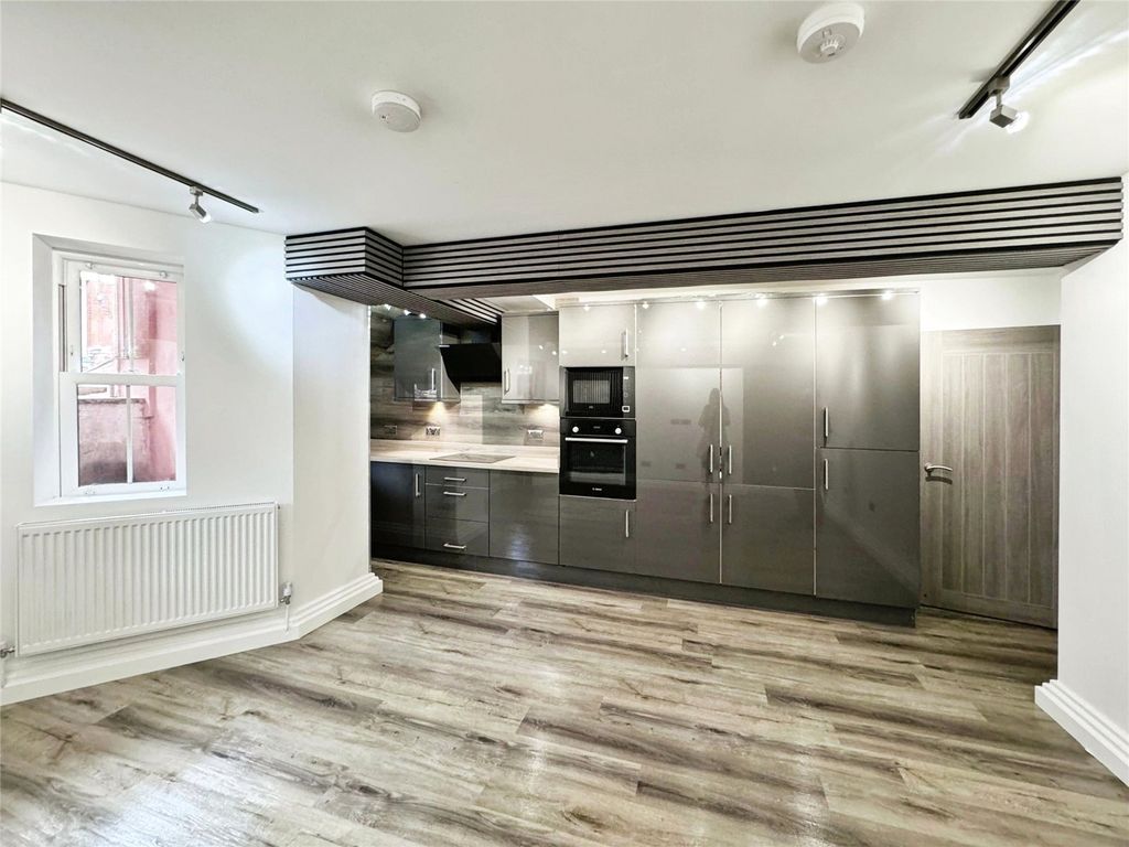 Property photo 3 of 12 Kitchen Living Room