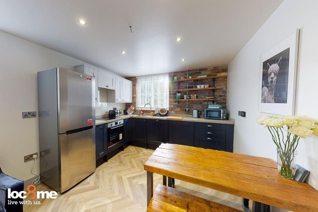 Property photo 2 of 8 A Modern And Spacious Kitchenette Featuring Stylis...