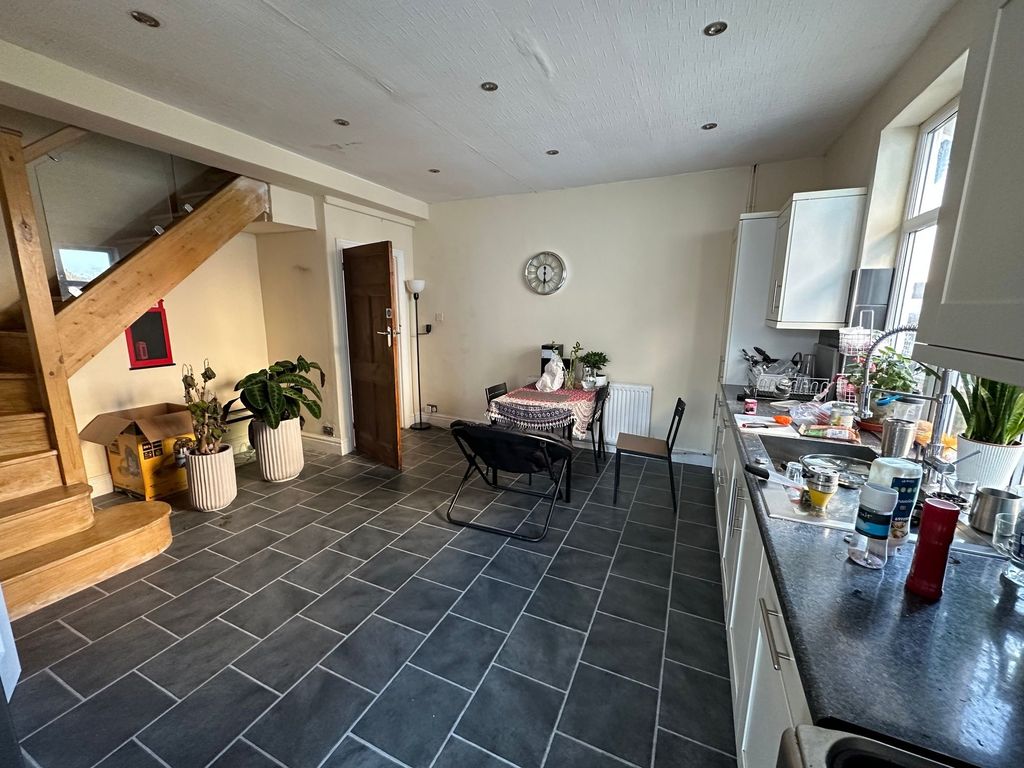 Property photo 2 of 5 Open-Plan Kitchen And Dining Area With Modern Dark...