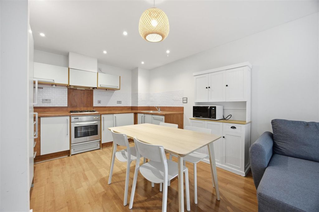 Property photo 2 of 12 Kitchen/ Living Area
