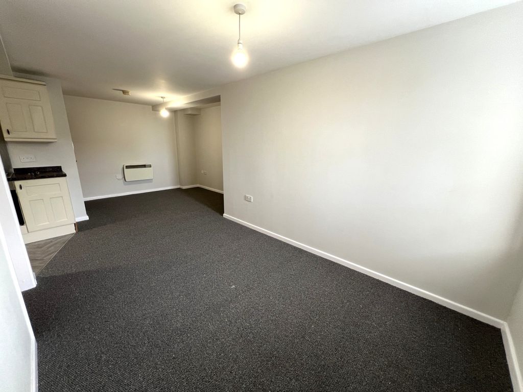 Property photo 3 of 12 Living Area