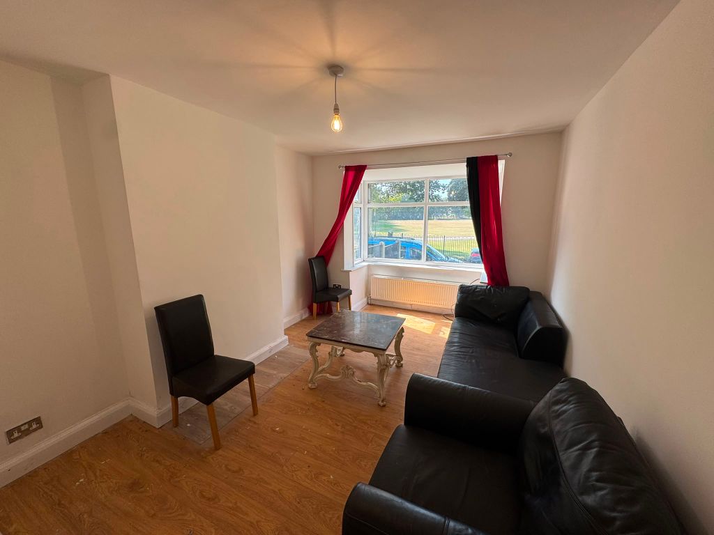 Property photo 2 of 12 Living Room 1