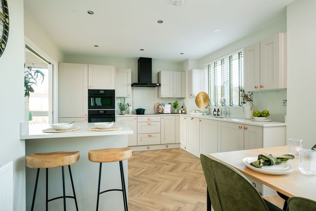 Property photo 3 of 18 A Modern Kitchen Area With An Island Counter