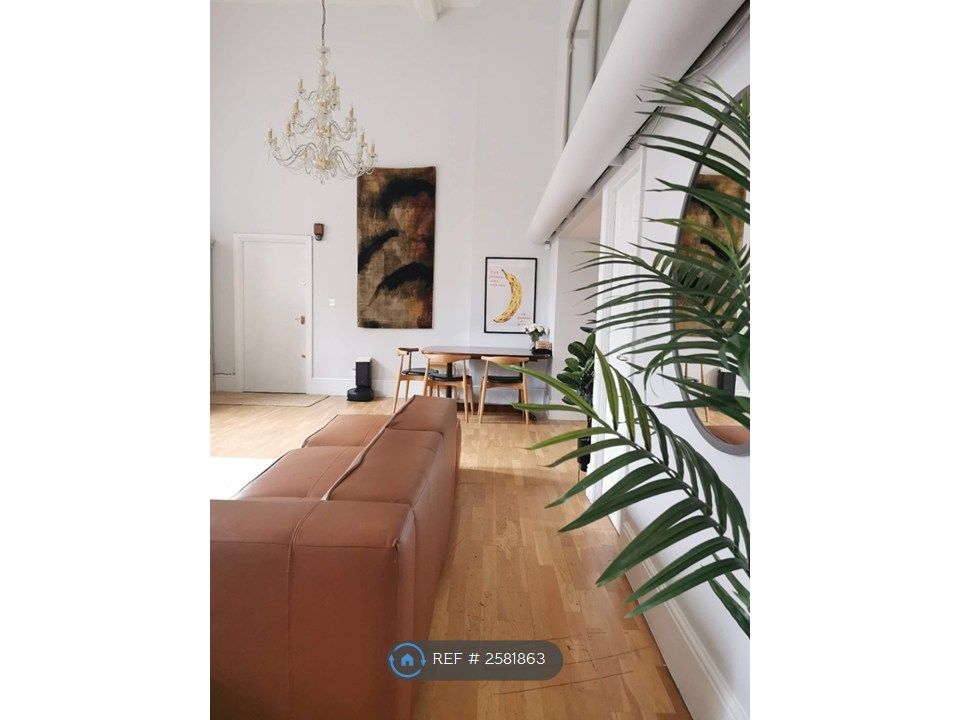 Property photo 2 of 11 Double-Height Living Room