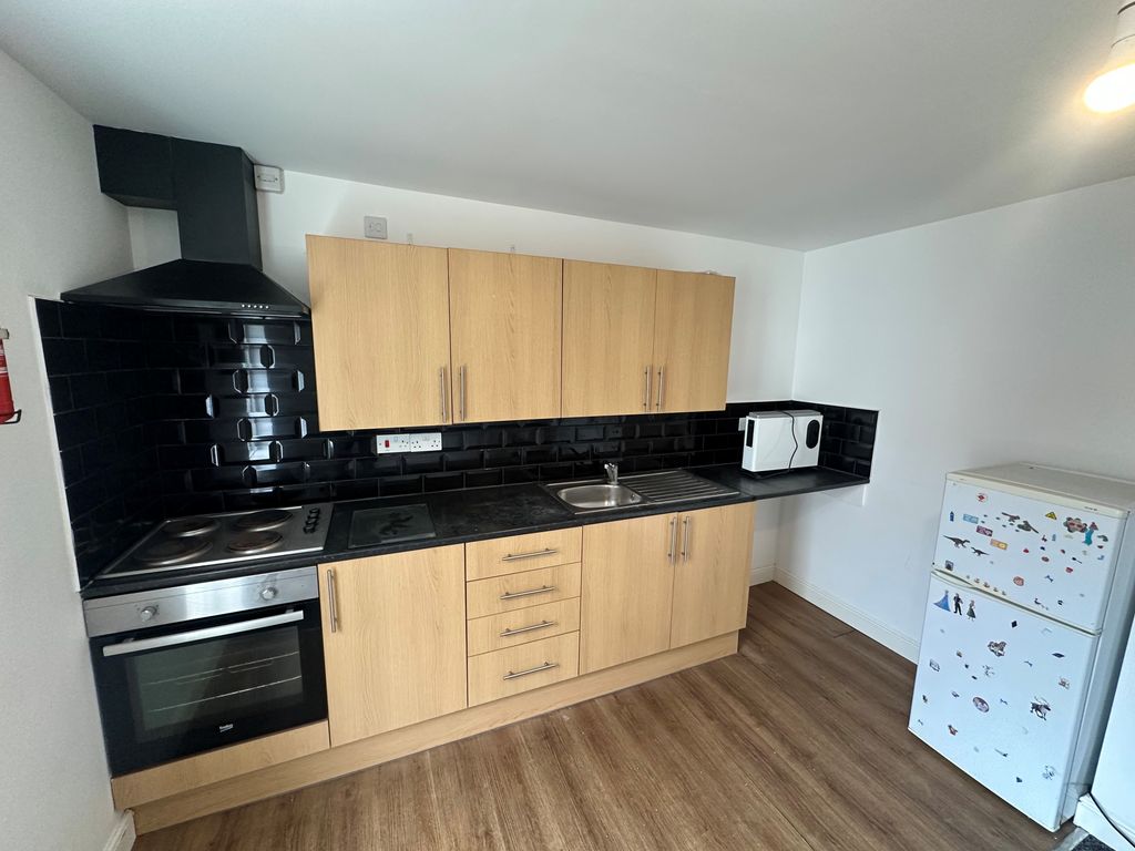 Property photo 3 of 6 Kitchen