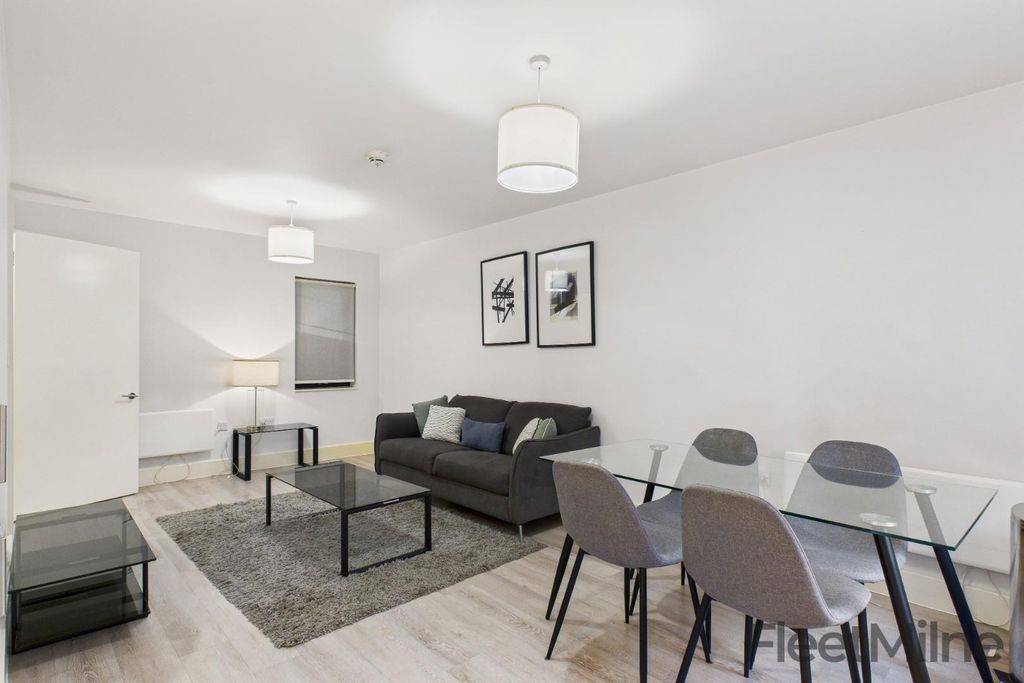 Property photo 3 of 11 Living Area / Dining Area