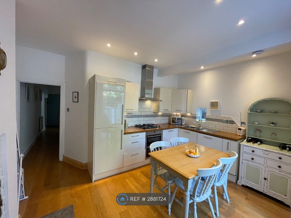 Property photo 3 of 9 Kitchen With Dining Table