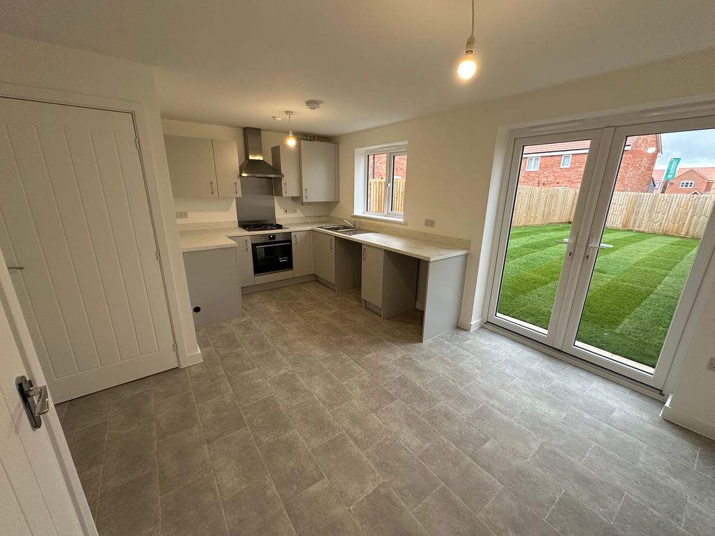 Property photo 3 of 12 Kitchen
