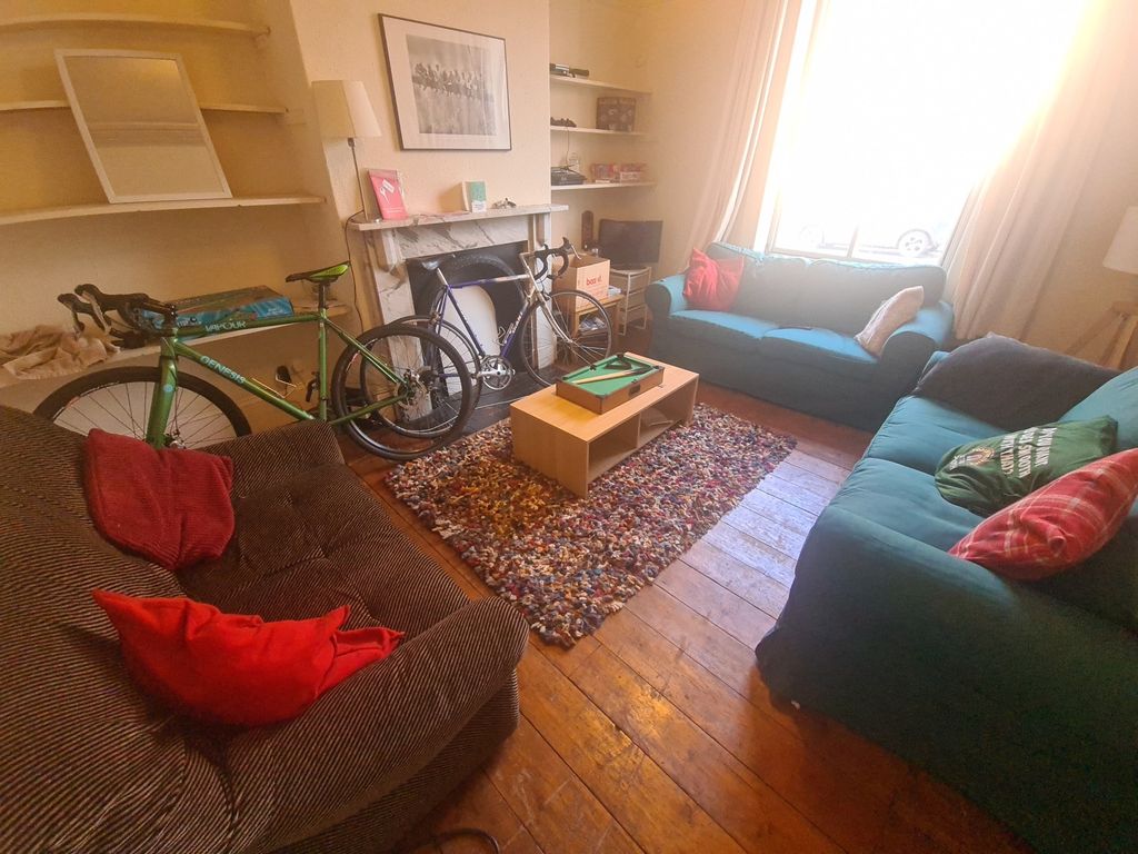 Property photo 3 of 19 A Cozy And Inviting Living Room Filled With Natura...