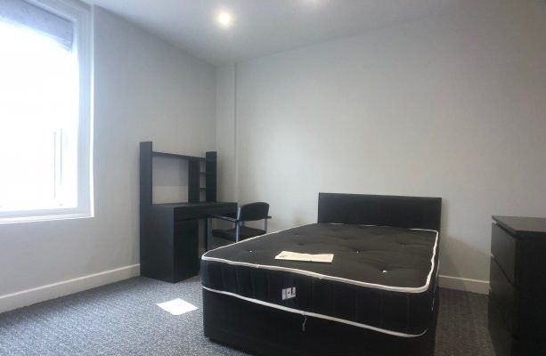 Property photo 3 of 8 A Bright And Neat Bedroom Featuring A Comfortable ...