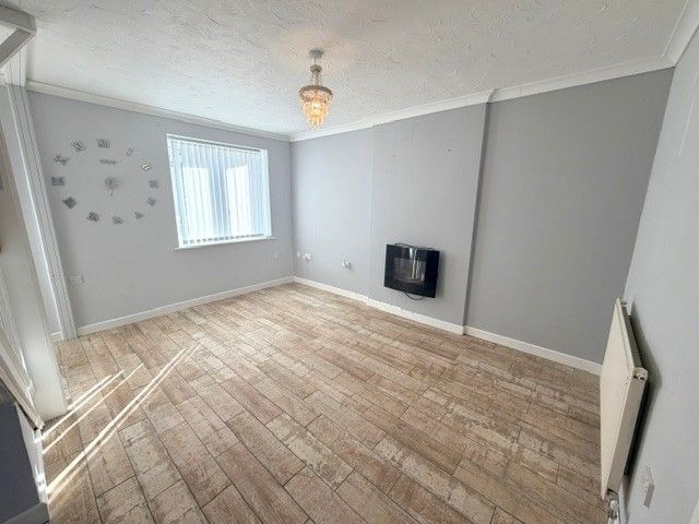 Property photo 2 of 8 Living Room