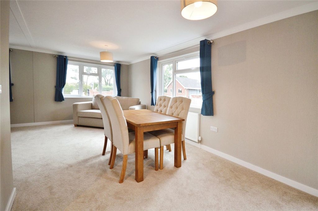 Property photo 3 of 12 Lounge/Dining Area