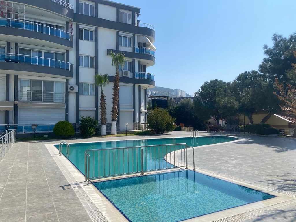 Property photo 3 of 24 Sea-View Apartment For Sale In Kusadasi - Communal Swimming Pool