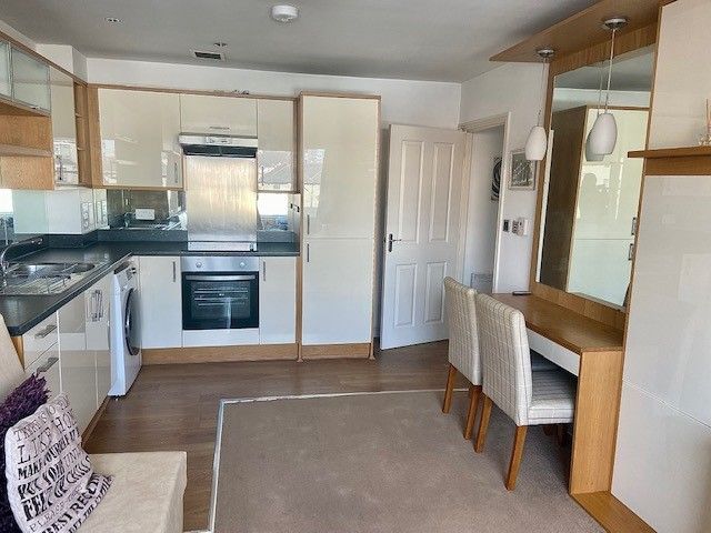 Property photo 3 of 8 Kitchen